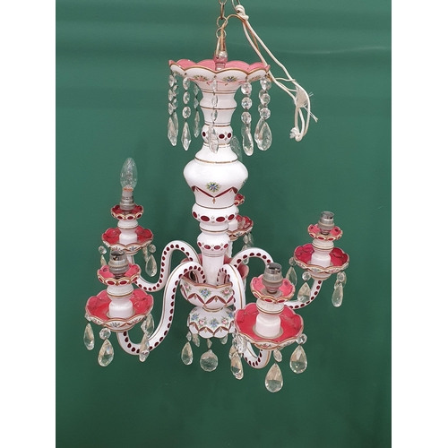 508 - A five branch overlaid glass Electrolier with clear pendant glass drops and painted sprays of flower... 