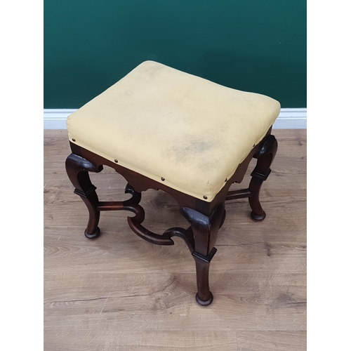 539 - An antique Footstool in the William and Mary style with yellow cushion upholstered seat upon walnut ... 