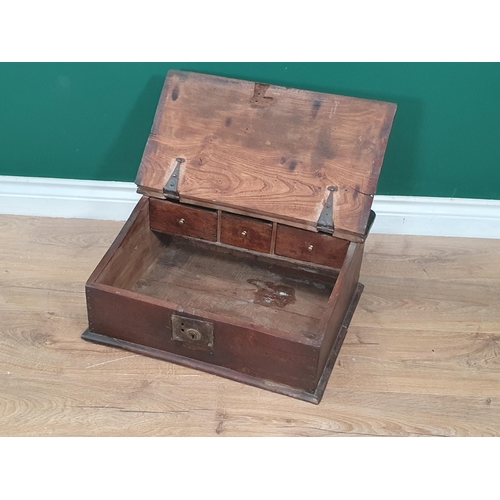 542 - An 18th Century country elm slope fronted Desk Box, the hinged lid enclosing three drawers 1ft 8in W... 