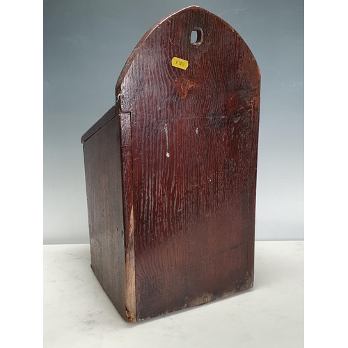 548 - An antique oak Salt Box with sloping lid beneath arched surmount, 18in H x 9in W