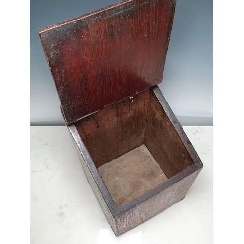 548 - An antique oak Salt Box with sloping lid beneath arched surmount, 18in H x 9in W