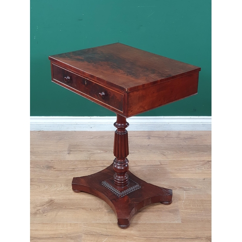 553 - An early 19th Century mahogany Work Table, the rectangular top fitted frieze drawer raised on turned... 