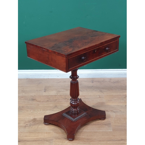 553 - An early 19th Century mahogany Work Table, the rectangular top fitted frieze drawer raised on turned... 