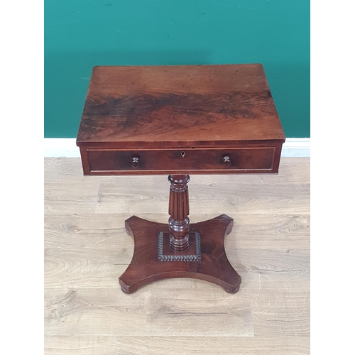 553 - An early 19th Century mahogany Work Table, the rectangular top fitted frieze drawer raised on turned... 