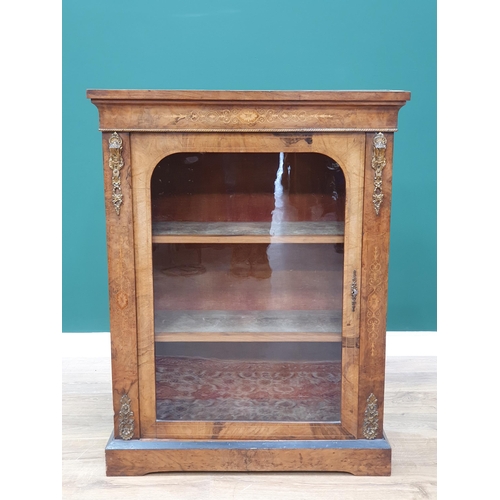 557 - A Victorian walnut Display Cabinet with single glazed door, satinwood inlay and gilt-metal mounts, 2... 