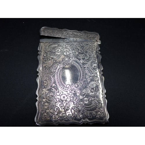 56 - A Victorian silver Card Case with butterfly and floral engraving, vacant cartouches, Birmingham 1897... 