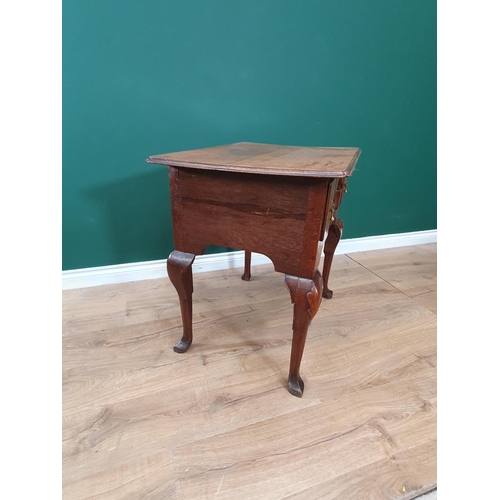 569 - An 18th Century oak Lowboy, the moulded top above four crossbanded drawers forming a block front abo... 