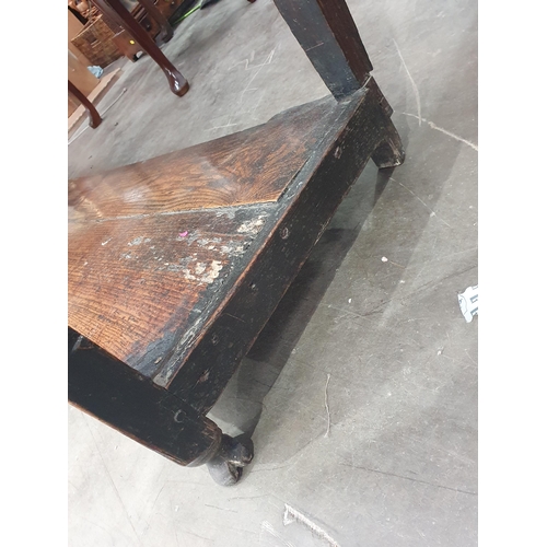 573 - An 18th Century oak Dresser Base fitted three moulded drawers, raised on baluster turned and squared... 