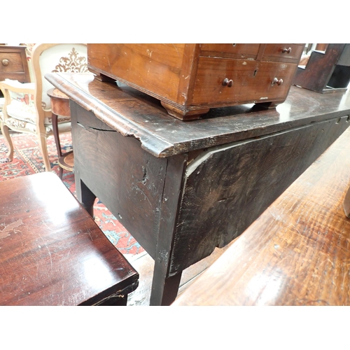 573 - An 18th Century oak Dresser Base fitted three moulded drawers, raised on baluster turned and squared... 