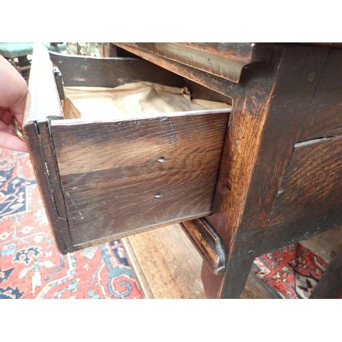 573 - An 18th Century oak Dresser Base fitted three moulded drawers, raised on baluster turned and squared... 