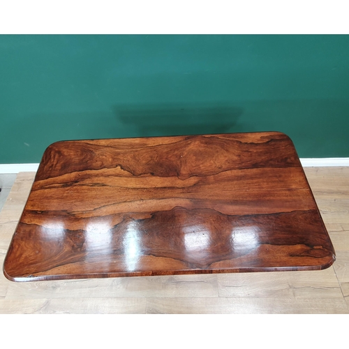 576 - A 19th Century rosewood Centre Table with rounded rectangular top, raised on pairs of spiral support... 