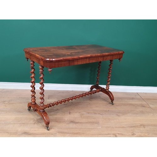 576 - A 19th Century rosewood Centre Table with rounded rectangular top, raised on pairs of spiral support... 