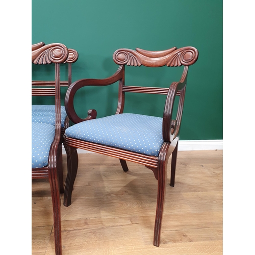 579 - A set of eight Regency mahogany Dining Chairs with fan scrolled top rails, drop-in seats on reeded s... 