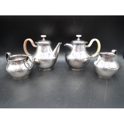 60 - An Elizabeth II silver three piece Tea Service of bulbous form, London 1961, and a matching Coffee P... 