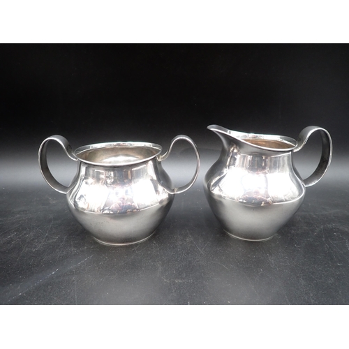 60 - An Elizabeth II silver three piece Tea Service of bulbous form, London 1961, and a matching Coffee P... 