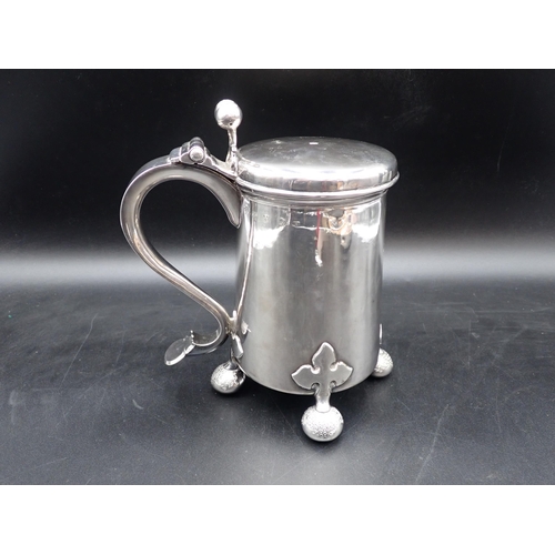 61 - A George III silver Tankard in the Scandinavian style with hinged lid having double bud thumb piece,... 