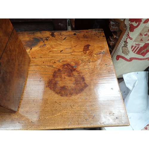 613 - An 18th Century Shropshire elm Dresser Base fitted three drawers on squared supports with shaped fri... 