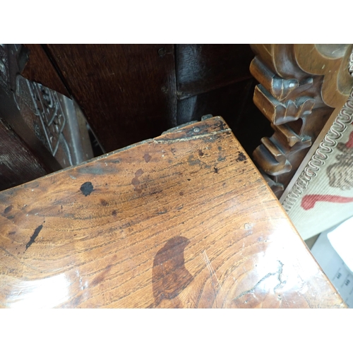 613 - An 18th Century Shropshire elm Dresser Base fitted three drawers on squared supports with shaped fri... 