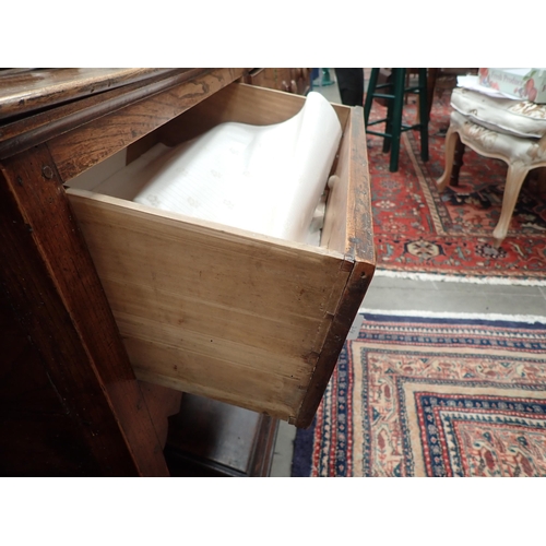 613 - An 18th Century Shropshire elm Dresser Base fitted three drawers on squared supports with shaped fri... 