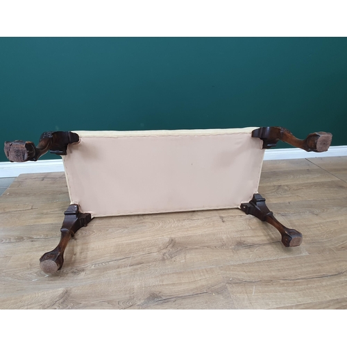 614 - A Georgian style mahogany Dressing Stool, upholstered in suede and raised on carved cabriole support... 