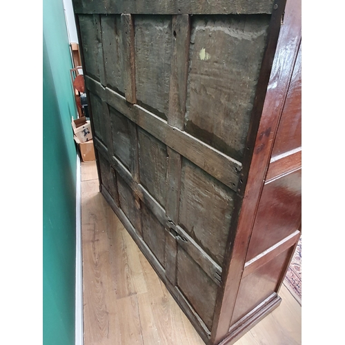 626 - A 17th Century oak Food Cupboard having a pair of pierced and panelled doors on later plinth base, 5... 