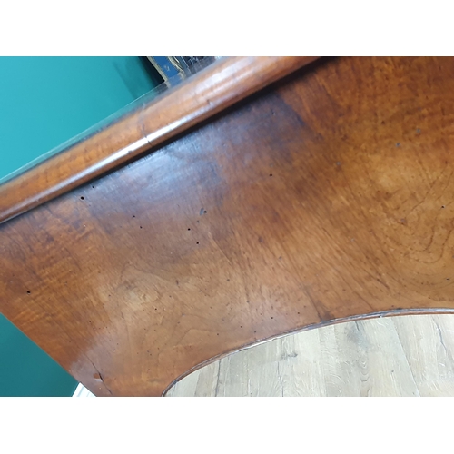 636 - A Georgian walnut Lowboy with quarter veneered, feather banded top above three drawers surrounding a... 