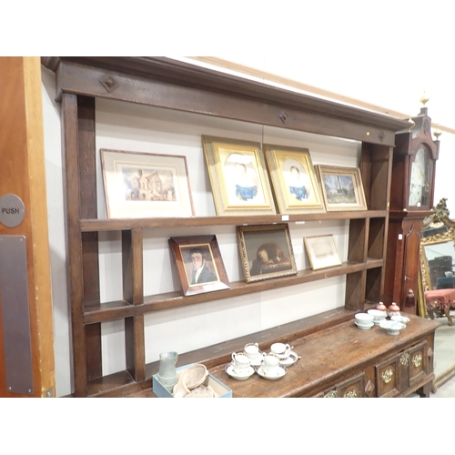 637 - A late 17th Century oak Dresser and Rack the base fitted three moulded drawers divided by lozenge bo... 