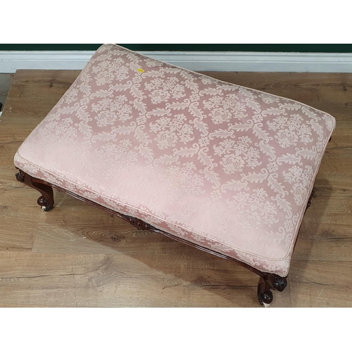 638 - A 19th Century Dressing Stool with upholstered seat and raised on carved scrolled supports and caste... 