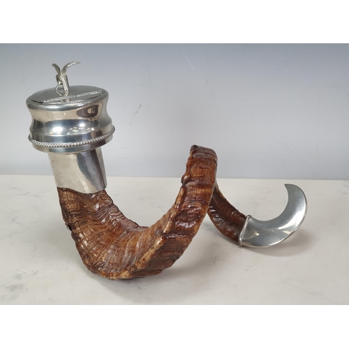 64 - A Ram's Horn Snuff Mull with plated mounts including a figure of an eagle to the hinged cover, 12in