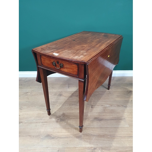 641 - A 19th Century mahogany and crossbanded Pembroke Table with butterfly drop leaves, fitted frieze dra... 