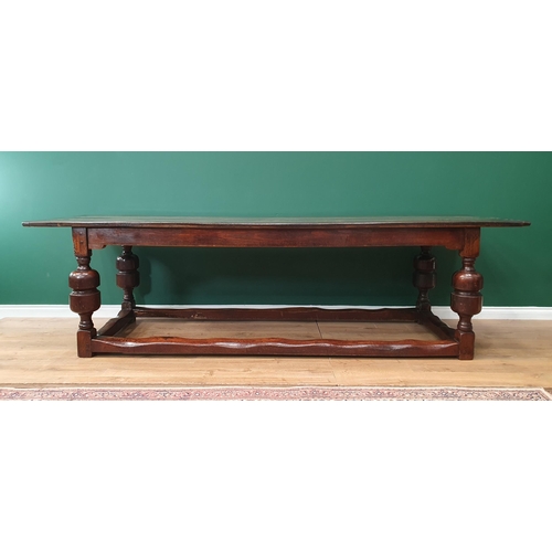 643 - An antique oak Refectory Table with 17th Century elements, having a three plank cleated top, raised ... 