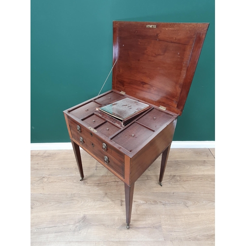 654 - A 19th Century mahogany Dressing Stand, the hinged crossbanded top enclosing central mirror (frame A... 