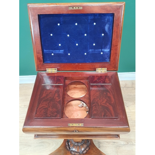 656 - A 19th Century mahogany Teapoy, the hinged cover enclosing two covered boxes and spaces for two mixi... 