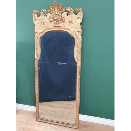 658 - A George II gesso Pier Glass, the two panels of mirror glass enclosed by strapwork and surmounted by... 