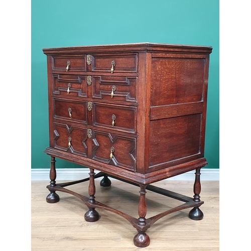 662 - An 18th Century oak Chest on Stand, the two short and three long drawers with moulded drawer fronts,... 