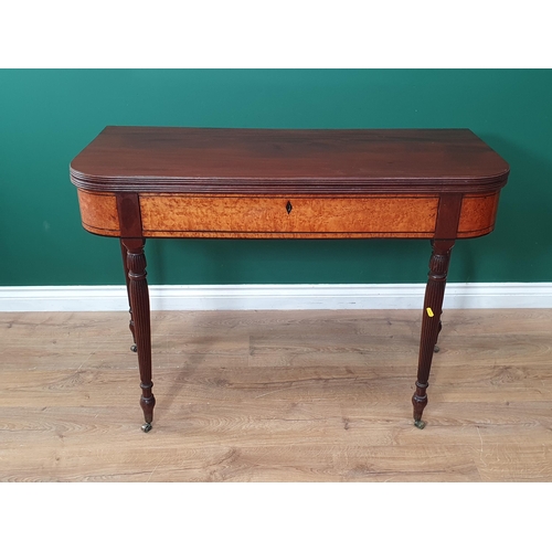 670 - A 19th Century mahogany fold-over Tea Table with reeded edge above a bird's eye maple frieze, fitted... 