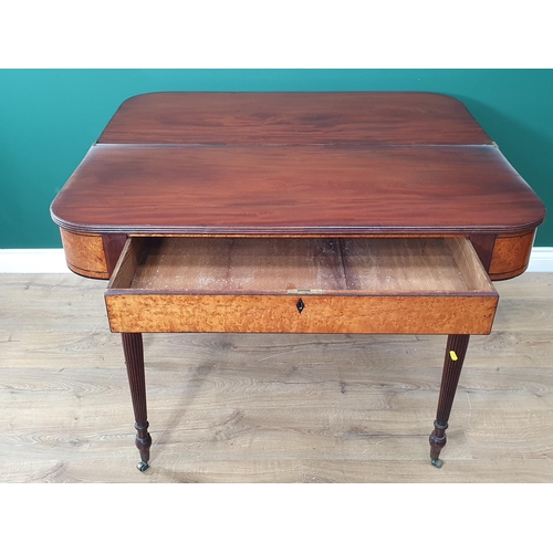 670 - A 19th Century mahogany fold-over Tea Table with reeded edge above a bird's eye maple frieze, fitted... 