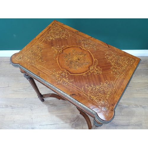 674 - A satinwood marquetry Card Table, the fold-over top with floral scrolled design, raised on fluted ta... 