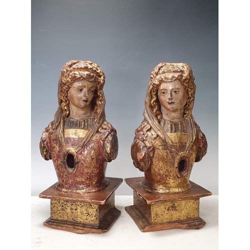 676 - A pair of 18th Century Spanish lime wood Reliquaries, carved in the form of female figures with natu... 