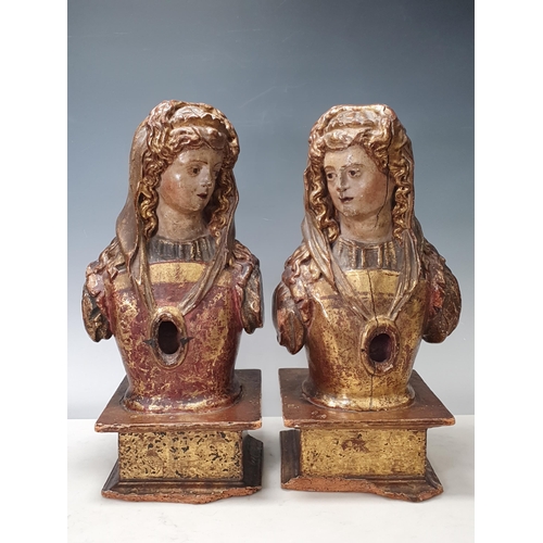 676 - A pair of 18th Century Spanish lime wood Reliquaries, carved in the form of female figures with natu... 