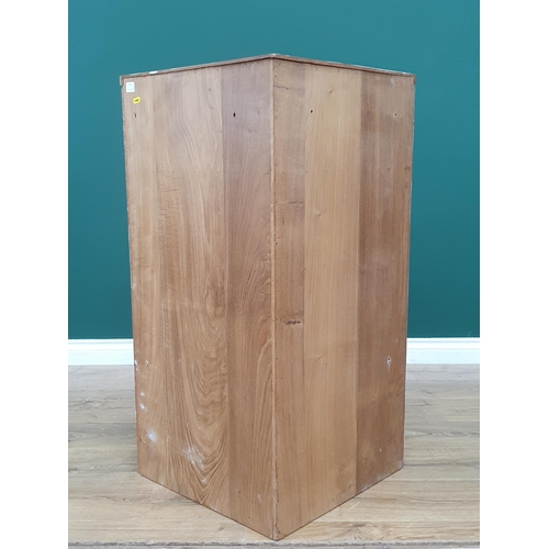 679 - A Mouseman Thompson oak hanging Corner Cupboard with 8 panel door