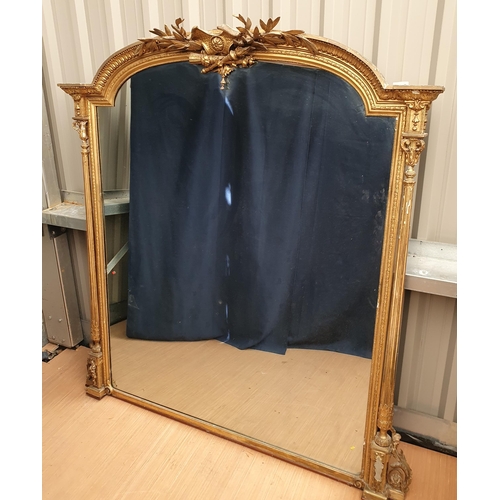 681 - A 19th Century gilded Overmantle Mirror of large proportions decorated olive branch, quiver and torc... 