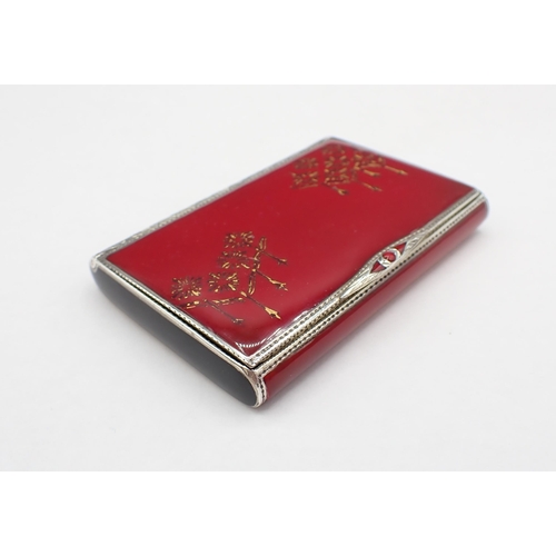 71 - A 1920's Continental silver and red enamel Cigarette Case with starburst design to lid, maker; PNV?,... 