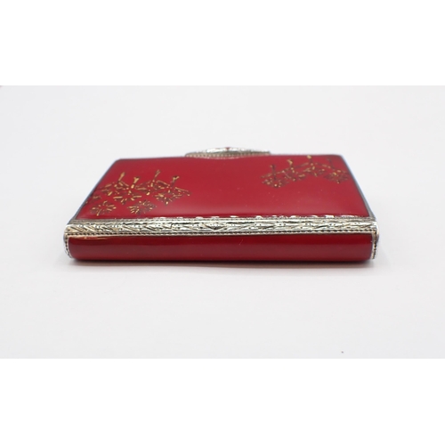 71 - A 1920's Continental silver and red enamel Cigarette Case with starburst design to lid, maker; PNV?,... 