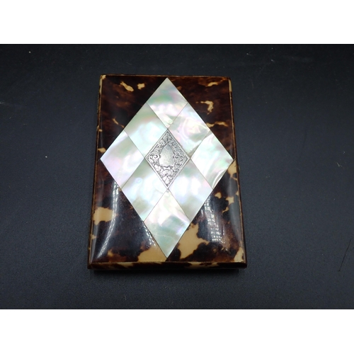 85 - A Victorian tortoiseshell and mother-of-pearl Card Case, inset silver diamond cartouche with floral ... 