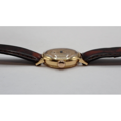 92 - A gentleman's New Ardath Incabloc Wristwatch the copper coloured dial with roman numerals at quarter... 