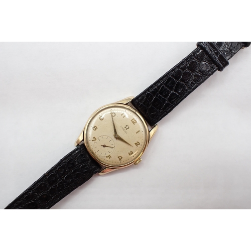 93 - A gentleman's Omega manual wind Wristwatch the cream dial with arabic numerals and subsidiary dial a... 