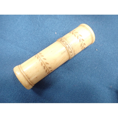 415 - A carved bone Etui with threaded cover and leafage design, 2¾in H, a bone Patch Box and Cover, two h... 