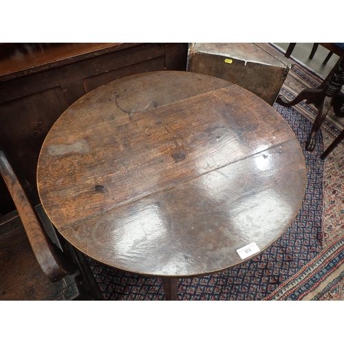 572 - An 18th Century oak Cricket Table with lower galleried tier on three chamfered supports (lower secti... 