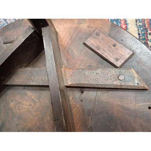 572 - An 18th Century oak Cricket Table with lower galleried tier on three chamfered supports (lower secti... 